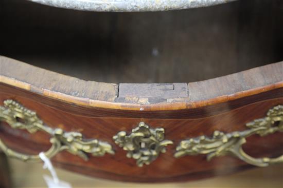 A Louis XVI marble topped and ormolu mounted serpentine commode, W.2ft 8in.